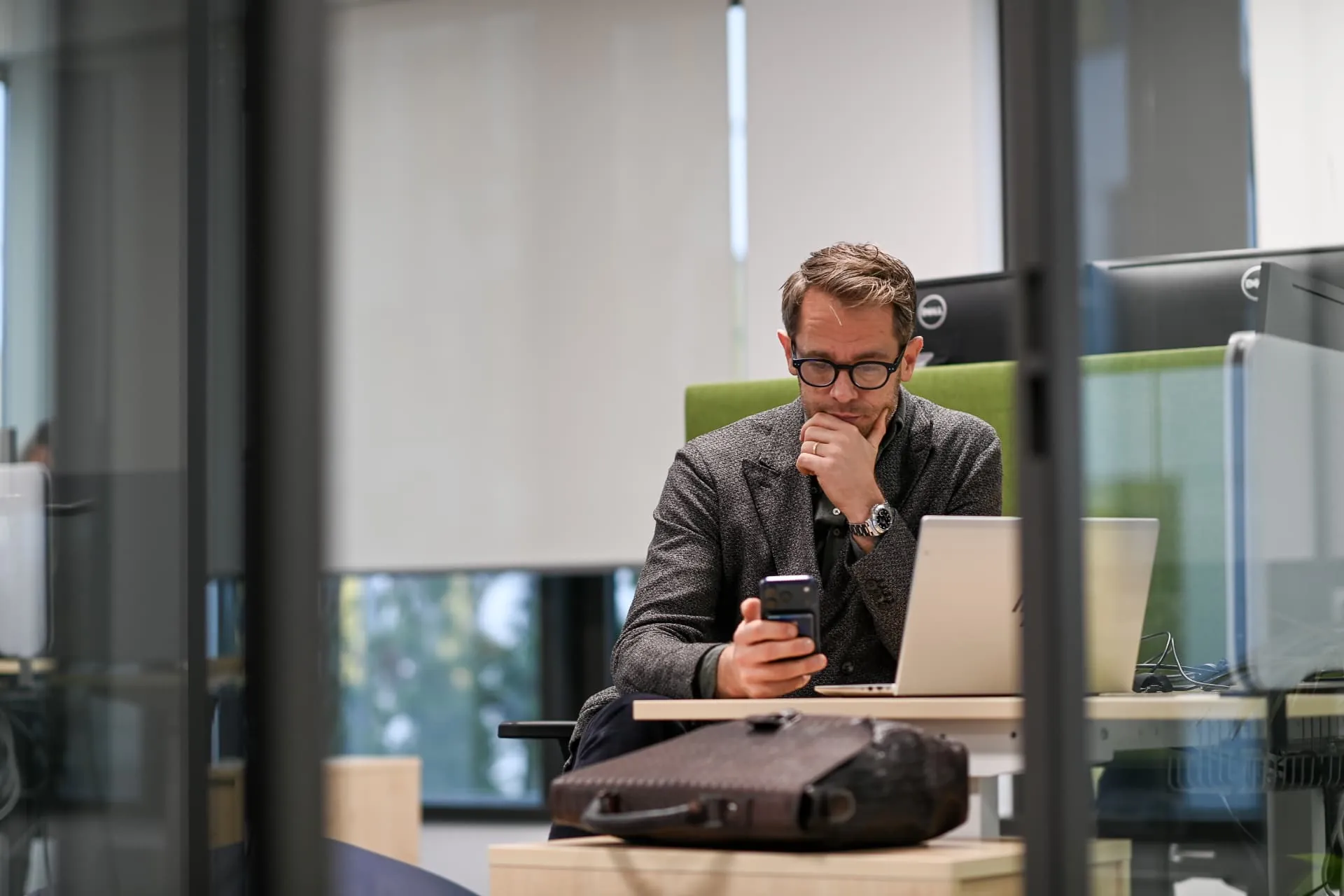 A colleague working at his desk